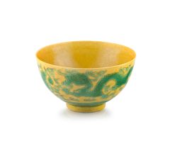 A Chinese yellow-ground green-enamelled ‘dragon’ bowl, Guangxu marks and period, 1875-1908