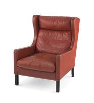 A Danish leather high-back armchair in the style of Borge Mogenson, manufactured by George Thams