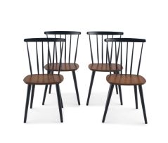 A set of four ebonised and teak spindle chairs, designed by Farstrup, 1960s, Denmark