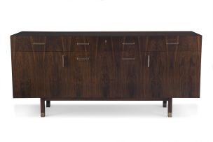 A Danish rosewood and maple-lined sideboard designed in the 1960s by Axel Christiansen Odder for ACO Møbler