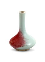 A Chinese copper-red splash miniature bottle vase, Qing Dynasty, 18th century