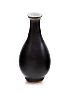 A Chinese ‘mirror black’ glazed miniature vase, Qianlong period (1735-1796)
