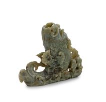 A Chinese celadon jade ‘dragon carp’ vase, late Qing Dynasty