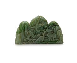 A Chinese celadon jade brush rest, Qing Dynasty, 19th century