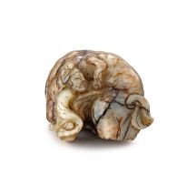 A Chinese grey and brown jade carving of an elephant, Qing Dynasty, 19th century