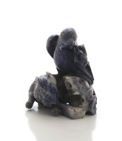 A Chinese lapis lazuli and howlite carving of a hawk and rabbit, 20th century