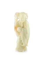 A Chinese pale celadon jade carving of an Immortal, Qing Dynasty, late 18th century