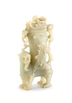 A Chinese pale celadon jade carved vase and cover group, late Qing Dynasty