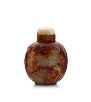 A Chinese celadon and rust jade snuff bottle, Qing Dynasty, 18th/19th century