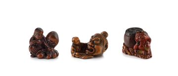 A wood figure netsuke of a fisher-girl and an octopus, 19th century