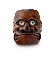 A wood Noh mask netsuke of O-Beshi-Mi, 19th century
