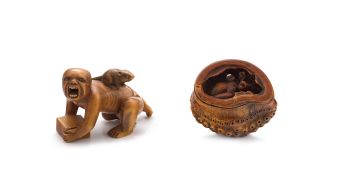 A wood netsuke of a disappointed rat catcher, mid 19th century