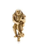 An ivory netsuke of a fisherman with an octopus, 19th century