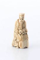An ivory figure of a courtier, 19th century