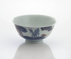 A Chinese underglaze-blue and copper-red glazed bowl, Qing Dynasty, 19th century