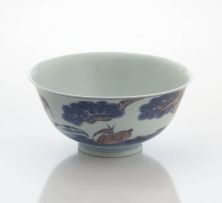 A Chinese underglaze-blue and copper-red glazed bowl, Qing Dynasty, 19th century