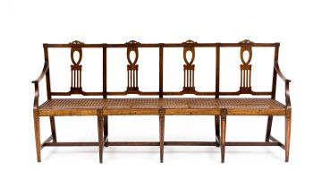 An important South Western Cape Neoclassical stinkwood and yellowwood inlaid settee, late 18th/early 19th century