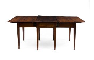 A Cape Neoclassical stinkwood double gate-leg dining table, late 18th/early19th century