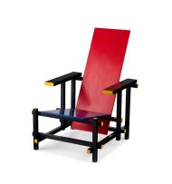A Gerrit Rietveld red and blue 'Model 763' armchair, designed 1923, manufactured by Cassina, 1970s
