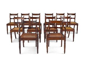 A set of twelve Cape stinkwood dining chairs, 19th century