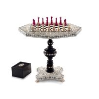 An Anglo-Indian ivory, horn, sandalwood and tortoiseshell miniature chess table, Vizagapatam, 19th century