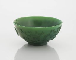 A Peking carved green-glass bowl, Qing Dynasty, late 19th/early 20th century