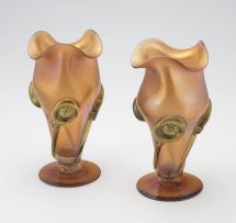 A pair of Art Nouveau iridescent orange glass vases, possible Loetz