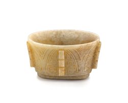 A Chinese pale celadon archaistic jade cup, Qing Dynasty, 19th century