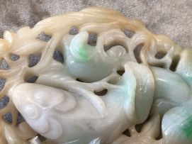 A Chinese carved jadeite plaque, Qing Dynasty, late 19th century