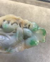 A Chinese carved jadeite plaque, Qing Dynasty, late 19th century