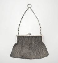 A George V silver chain mail handbag, with retailer's initials G & C, with import marks for Birmingham, 1910, .925 sterling