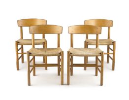 A set of four fruitwood side chairs, probably Danish, mid 20th century