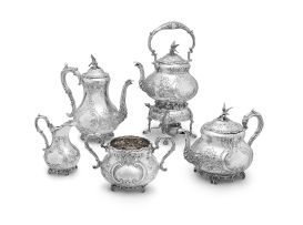 A Victorian assembled five-piece silver tea service, William Gibson & John Lawrence Langman retailed by Goldsmiths and Silversmiths Co, London, 1898-1899