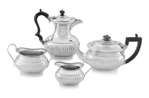 A late Victorian silver three-piece bachelor’s tea set, Samuel Smith, London, 1894