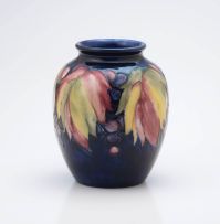 A William Moorcroft grape-and-leaf vase, 1928 - 1949
