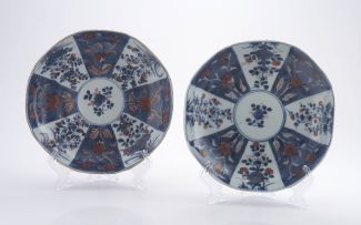 A pair of Chinese blue and white 'clobbered' dishes, Qianlong period, 1736-1795 and later
