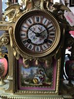 A French 'Sèvres' porcelain and gilt-bronze mounted clock garniture, circa 1850