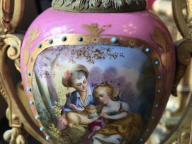 A French 'Sèvres' porcelain and gilt-bronze mounted clock garniture, circa 1850