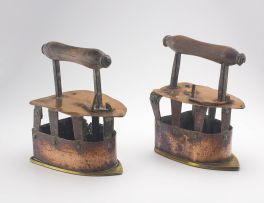 Two Cape copper and brass irons, 19th century
