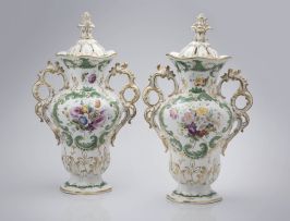 A pair of Staffordshire two-handled potpourri covered vases, 19th century