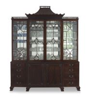 A Chippendale style flame mahogany breakfront bookcase, early 20th century