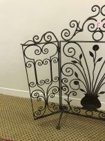 A wrought-iron fire screen, 20th century