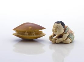 A Japanese ivory netsuke of the 'clam's dream'