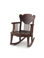 A child's fruitwood rocking chair