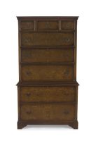 A George III style mahogany and burr walnut-veneered chest-on-chest manufactured by NS Fraser Ltd, London, Furniture Makers, 20th century