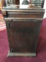 A Jacobean style oak and fruitwood spice cabinet, 19th century