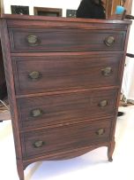 An Edwardian mahogany-veneered chest of drawers
