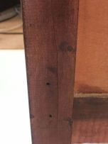 An Edwardian mahogany-veneered chest of drawers