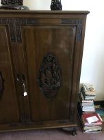 A Chinese carved teak cupboard, 20th century