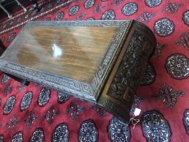 A Chinese carved hardwood low occasional table